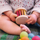 Houten rollend wiel regenboog - mini