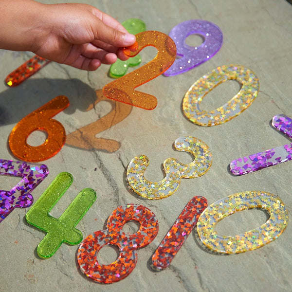 Doorschijnende regenboog glitter cijfers