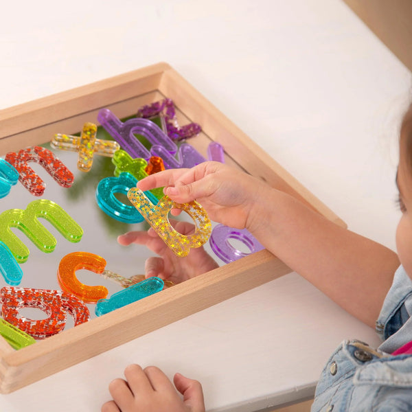 Doorschijnende regenboog glitter letters