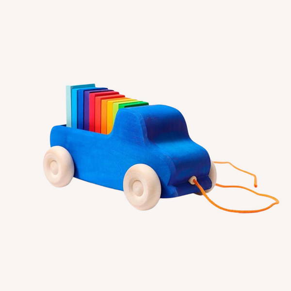 Trekvrachtwagen met regenboog plankjes